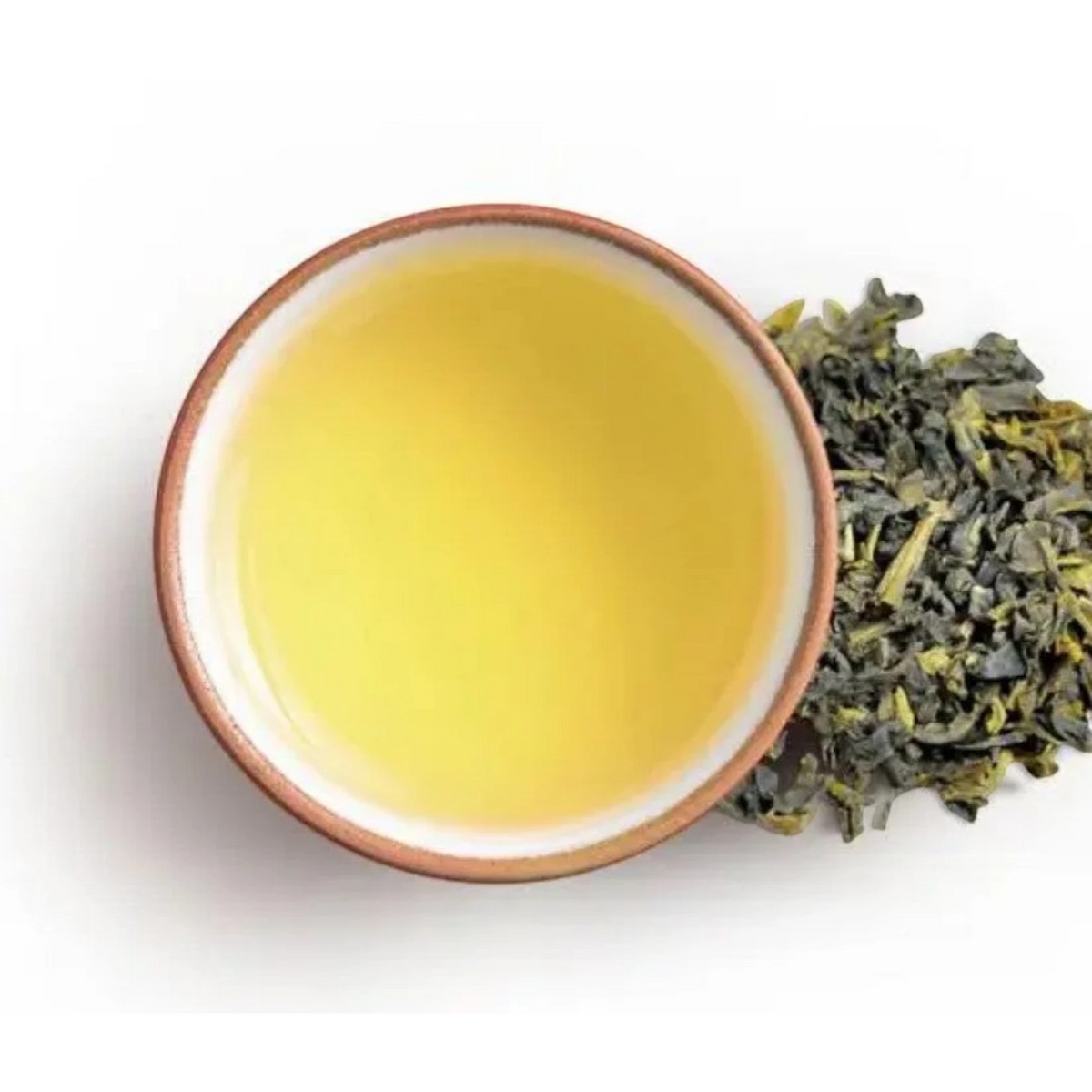 Beauty Secrets of Japan green tea floral water with a cup of brewed tea and dried green tea leaves on white background