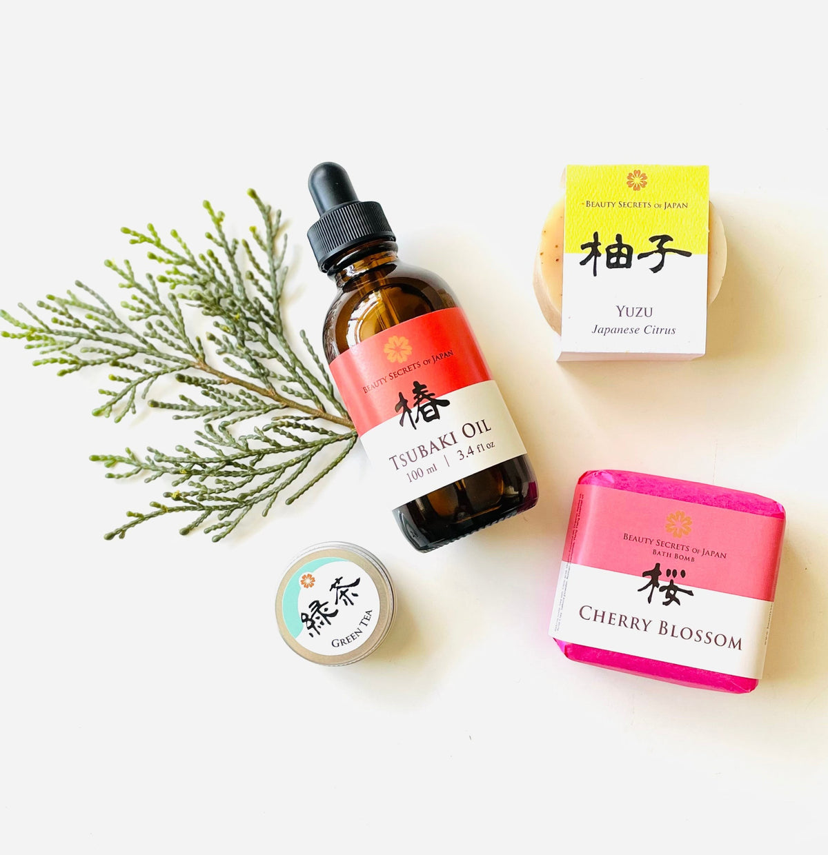 Beauty Secrets of Japan personalized gift set featuring Tsubaki oil, Yuzu soap, Cherry Blossom bath bomb, and lip balm.