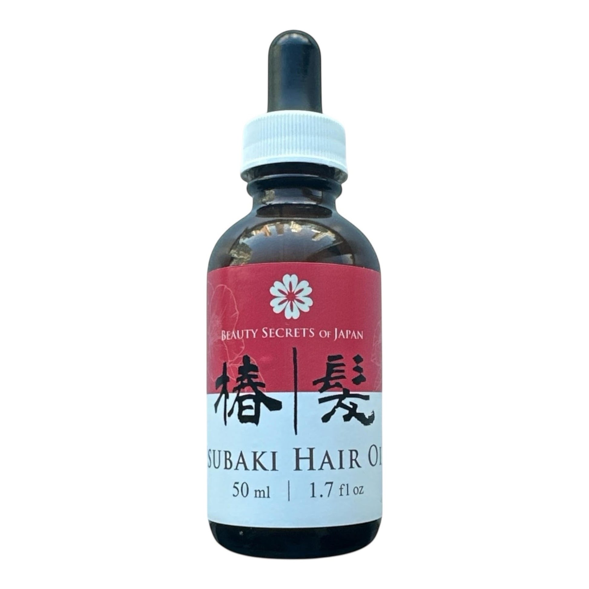 Beauty Secrets of Japan Tsubaki Hair Oil in a 50ml amber glass dropper bottle with a red and white label.