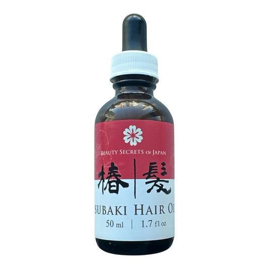 Beauty Secrets of Japan Tsubaki Hair Oil in a 50ml amber glass dropper bottle with a red and white label.